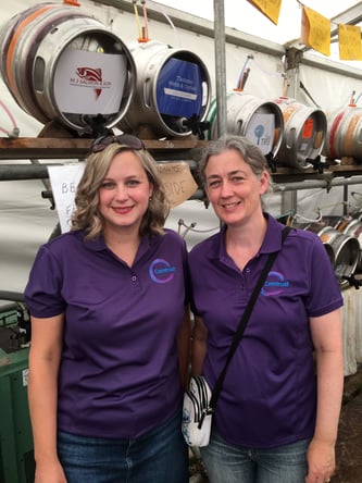 Camtrust staff Lilly and Amy volunteering at the local beer festival